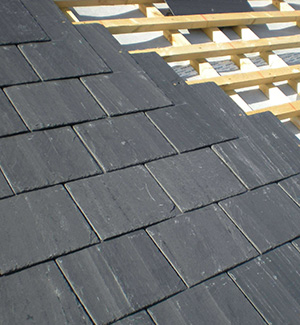 Part way through a slate roof in Stockport